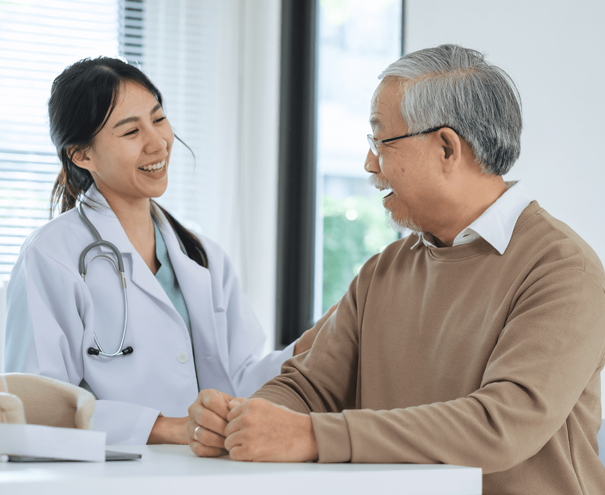 Medical professional and senior patient interaction