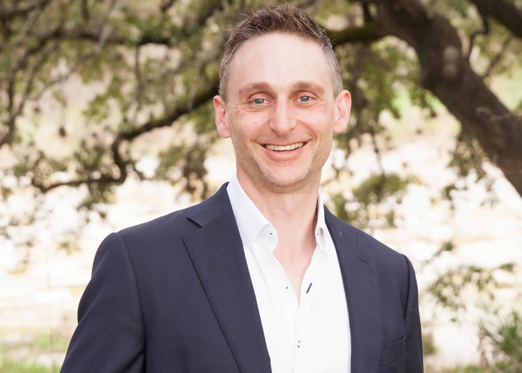 Happy man posing in formal attire